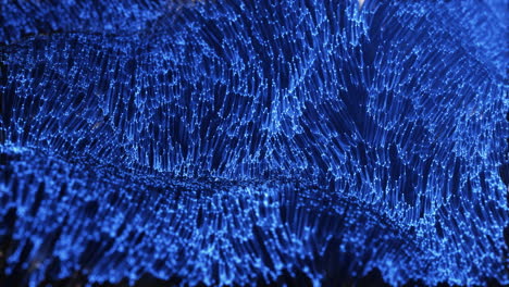 Abstract-phosphorescent-blue-wallpaper-waving-slowly